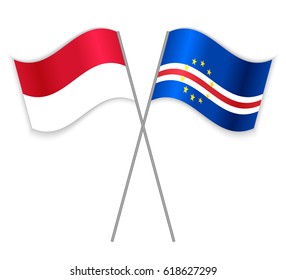 Indonesian and Cabo Verdean crossed flags. Indonesia combined with Cabo Verde isolated on white. Language learning, international business or travel concept.