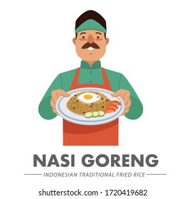 An Indonesian chef is holding a plate containing fried rice or Nasi Goreng in Bahasa Indonesia. Fried rice is an Indonesian rice dish. Nasi Goreng typically spiced with sweet soy sauce.