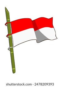 The Indonesian flag is tied to sharpened bamboo which is a symbol of the Indonesian nation's struggle for independence