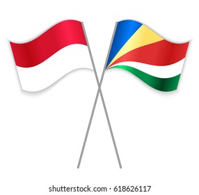 Indonesian and Seychellois crossed flags. Indonesia combined with Seychelles isolated on white. Language learning, international business or travel concept.