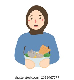 indonesian street food woman selling bakso or meatball