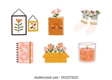 Indoors activities cozy hygge home elements cute illustration abstract boho wall decor, retro old books, comfort socks, notebooks, box and candle with blossom flowers.