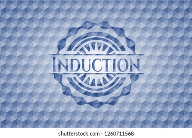 Induction blue badge with geometric pattern.