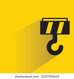 industrial crane hook icon with drop shadow on yellow background