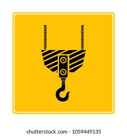 industrial hook symbol in yellow background