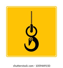 industrial hook symbol in yellow background