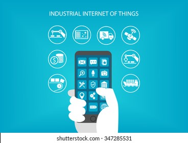 Industrial internet of things concept. Hand holding modern mobile device like smart phone to connect to various objects and devices