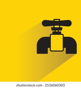 industrial valve and pipeline with shadow on yellow background