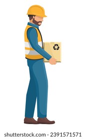 Industrial worker with his personal protective equipment, helmet, vest, safety shoes carrying a box. Safety First. Industrial safety and occupational health at work