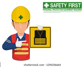 Industrial worker is presenting high visibility clothe sign