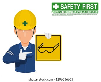 Industrial worker is presenting safety glasses sign