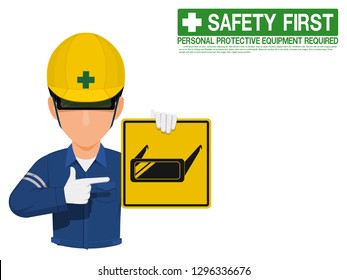 Industrial worker is presenting welding goggles sign