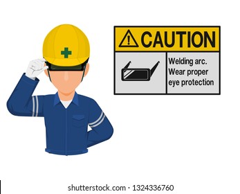Industrial worker is presenting welding goggles sign