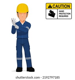 An industrial worker is putting on the gloves on white background