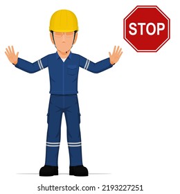 An industrial worker is raise hand to stop