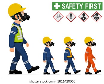 An industrial worker with respirator is walking
