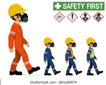 An industrial worker with respirator is walking
