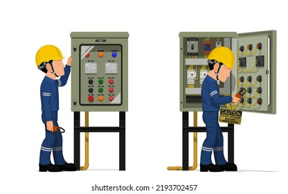 Industrial workers use clamp meter to measuring electric current in the electrical control cabinet