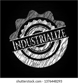 Industrialize chalk emblem written on a blackboard