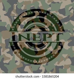 Inept written on a camo texture. Vector Illustration. Detailed.