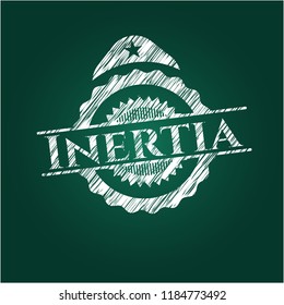 Inertia chalkboard emblem on black board