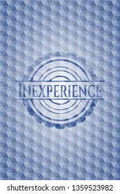 Inexperience blue badge with geometric background.