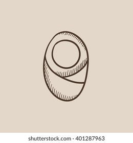 Infant wrapped in swaddling clothes sketch icon.
