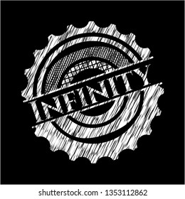Infinity chalkboard emblem written on a blackboard