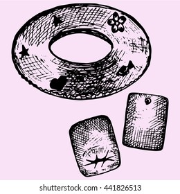 inflatable swim ring, pair water armbands doodle style sketch illustration hand drawn vector 