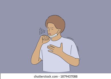 Influenza, fever, flu concept. Young black man coughing and feeling cold, coronavirus, getting infection virus during wearing medical protective mask outdoors.