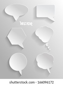 Infographic design with white communication bubbles on the grey background.