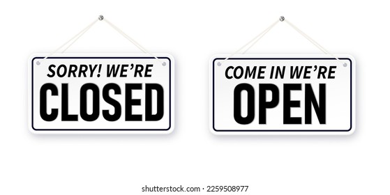 Information boards with Come in we're open and Sorry, We are closed. White signboard with a rope on background. Business concept for closed and open businesses, sites and services