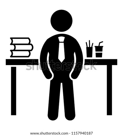 
An information clerk is standing with having books and stationary on table 
