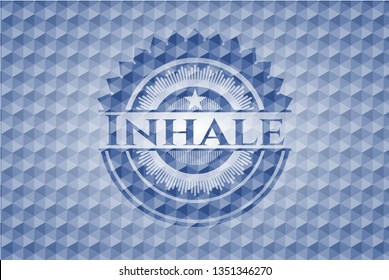 Inhale blue badge with geometric background.