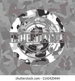 Inheritance written on a grey camouflage texture