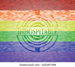 Inhospitable on mosaic background with the colors of the LGBT flag