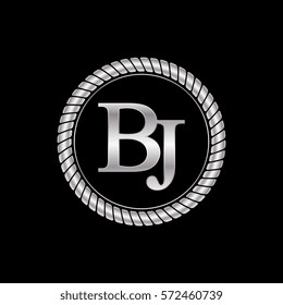 initial b and j logo silver metallic with metal circle rope frame border decorative