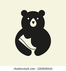 Initial Bear Shoe Negative Logo Space Vector Template. Bear Holding Shoe Symbol