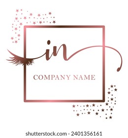 Initial IN calligraphy company eye and eyelash handwriting