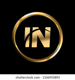 IN initial circle company logo gold black background
