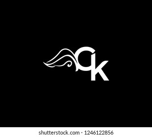 Initial CK Letter Linked Monogram Tribal Wings Logotype