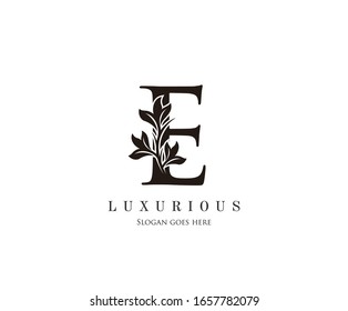 Initial E letter luxury beauty flourishes ornament monogram logo