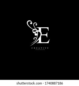 Initial E letter Unique attractive creative modern luxury beauty flourish ornament black white monogram logo. design vector logotype.
