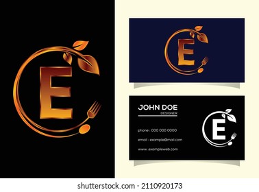 Initial E monogram alphabet with a fork, spoon, and leaf. Healthy natural food logo. Logo for cafe