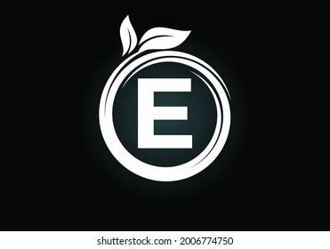 Initial E monogram letter alphabet in a spiral with green leaves. Font emblem. Nature icon sign symbol. Modern vector logo design for business healthcare, nature, farm, and company identity.