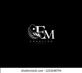 Initial EM letter luxury beauty flourishes ornament monogram logo