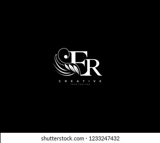 Initial ER letter luxury beauty flourishes ornament monogram logo