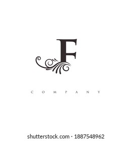 initial F logo with ornament