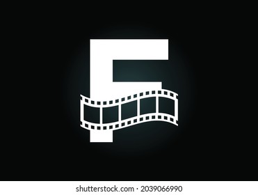 Initial F monogram alphabet incorporated with film reel. Video and movie logo concept. Font emblem. Logo for the entertainment business and company identity