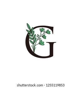 Initial G letter logo with Green Flower design 
